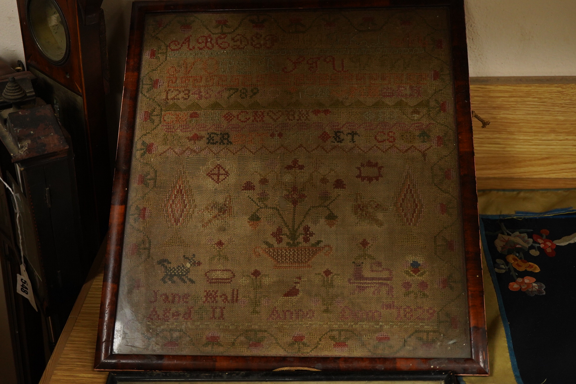 Three early 19th century samplers. One by Elizabeth Thoroughgood dated July 11th 1817, another from Ellen to Caroline, 22nd August 1829 and the third by Jane Hall aged 11, 1829. The first finely embroidered with a verse